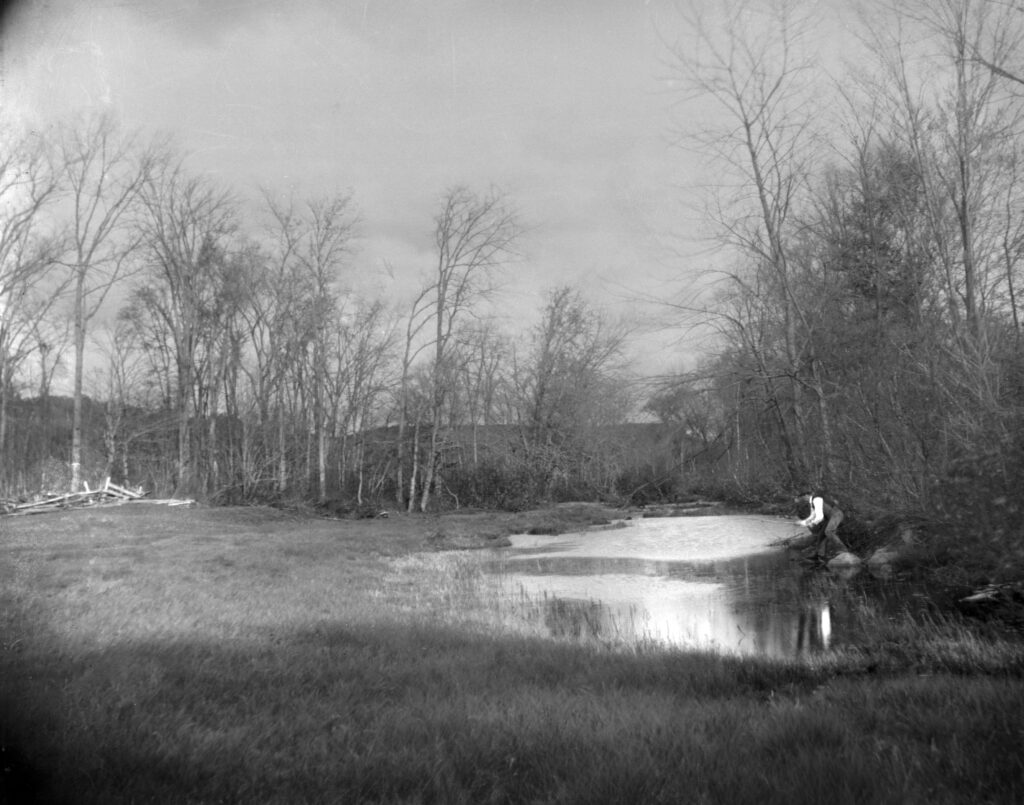 Vintage Person Fishing from Glass Plate